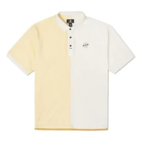 Converse Herren-Poloshirt mit Splicing-Colorblock-Revers und kurzen Ärmeln in Creme-Gelb